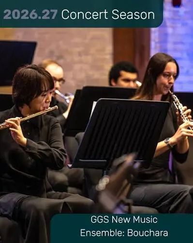 A group of students play in a band. One plays the flute, another plays the oboe.