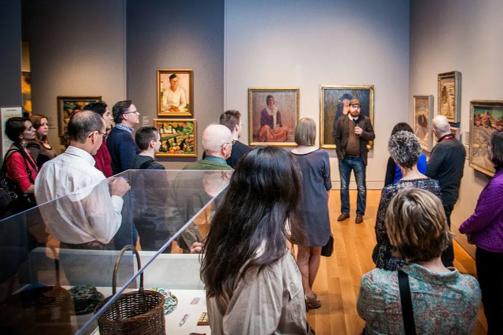 Group of people standing in gallery