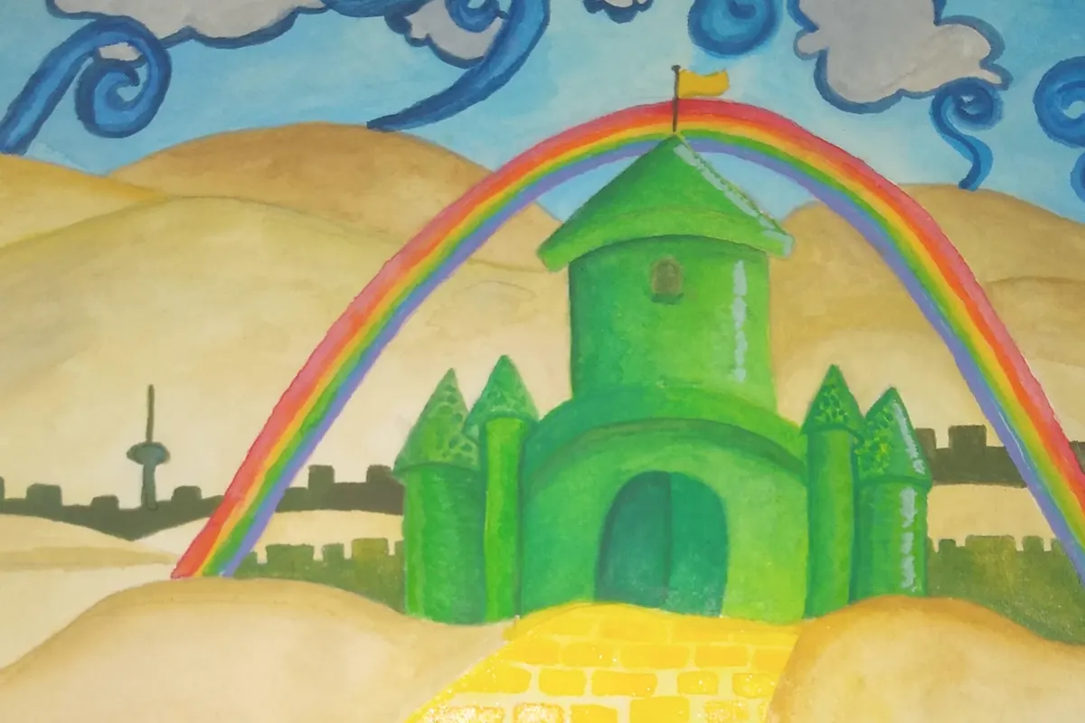 A rainbow going over an emerald castle, with the Toronto skyline set against a hilly background.